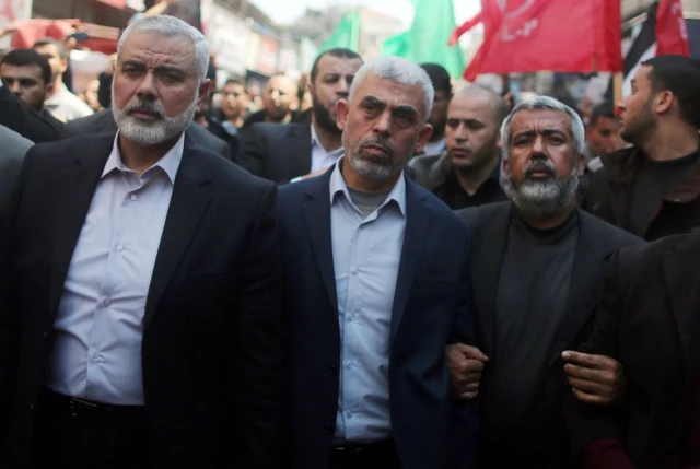 Hamas Gaza Chief Yehya Al-Sinwar (C) and Hamas leader Ismail Haniyeh (L) in Gaza City March 25, 2017. (Photo: Mohammed Salem/REUTERS)