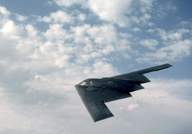 B2 plane from 509th tbomb wimg takes part in bombing mission over Afghanistan. Friday, October 12th, 2001. Photo: Reuters by John Lasky