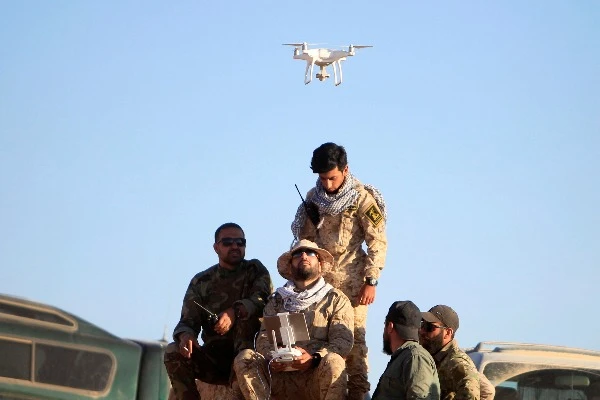 Hezbollah fighters fly a drone at Juroud Arsal, the Syria-Lebanon border, July 29, 2017 (Photo: REUTERS/Ali Hashisho).