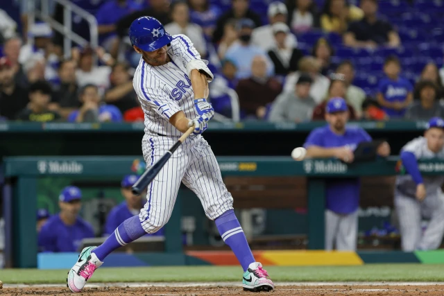 Illustrative image: Israel designated hitter Danny Valencia (19) hits a single during the second inning against Venezuela at LoanDepot Park. Photo via Reuters.