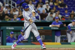 Illustrative image: Israel designated hitter Danny Valencia (19) hits a single during the second inning against Venezuela at LoanDepot Park. Photo via Reuters.