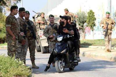 Lebanese army members man a checkpoint in Kfar Kila, near the border with Israel, in southern Lebanon October 13, 2023 (Photo: REUTERS/Karamallah Daher).