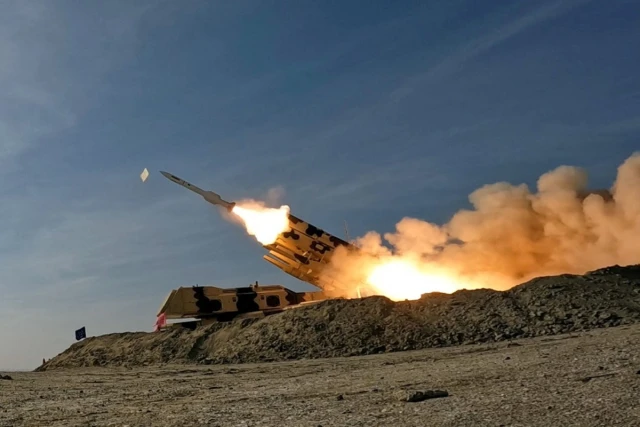 A missile is launched during a military exercise in an undisclosed location in the south of Iran, in this handout image obtained on January 19, 2024 (Iranian Army/WANA (West Asia News Agency)/Handout via REUTERS).