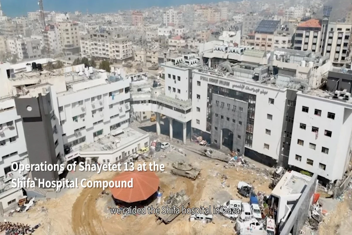 A tank drives near al-Shifa hospital, taken from video released on March 25, 2024 (Credit: Israel Defense Forces/Handout via REUTERS).