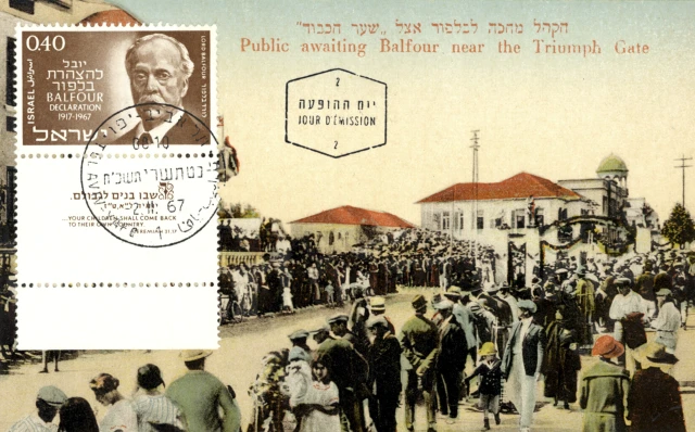 Public awaiting Arthur James Lord Balfour in Jerusalem in 1917; (add.info.: Public awaiting Arthur James Lord Balfour near the Triumph Gate in Jerusalem, 1917. Commemoration of the Balfour Declaration with cover day Israeli stamp (portrait of Balfour) on painted photographic postcard, 2nd November 1967 Photo: Reuters Connect