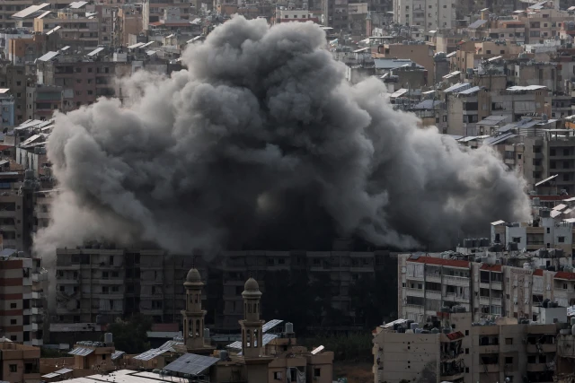 Smoke billows over Beirut's southern suburbs after an Israeli strike, amid the ongoing hostilities between Hezbollah and Israeli forces, as seen from Baabda, Lebanon, November 24, 2024. REUTERS/Mohamed Azakir