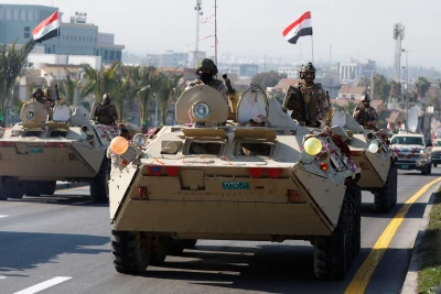 Iraqi soldiers ride military vehicles during a celebration of Iraq's "Victory Day", marking the historic defeat of Islamic State militants and the liberation of Iraqi territories, in Mosul, Iraq, December 10, 2024. Photo: Reuters Connect by Khalid Al-Mousily