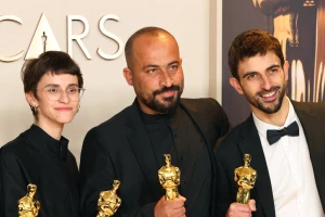 Hamdan Ballal (in the middle) in the Oscars photo room at the 97th Academy Awards in Hollywood, Los Angeles, California, U.S., March 2, 2025. REUTERS/Daniel Cole