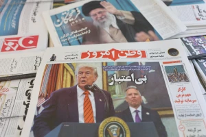 An Iranian newspaper with a cover photo of U.S. President Donald Trump and U.S. Middle East envoy Steve Witkoff, is seen in Tehran, Iran, May 11, 2025. Majid Asgaripour/WANA (West Asia News Agency) via REUTERS