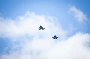 F-15 Eagle fighter jets fly over the Oregon State Capitol during the Armed Forces Day celebration on Wednesday, May 14, 2025 in Salem, Oregon Photo: Reuters Connect