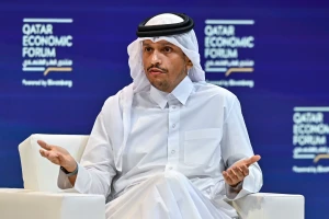 Qatari Prime Minister Mohammed bin Abdulrahman Al-Thani speaks with host Joumanna Bercetche during the opening session of the Qatar Economic Forum 2025 in Doha, Qatar, on May 20, 2025. (Photo by Noushad Thekkayilvia Reuters)