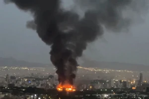 Smoke rises from a fire, as the Israel-Iran air war continues, in Tehran, Iran, in this still image obtained from social media video released June 17, 2025. Photo: Reuters Connect
