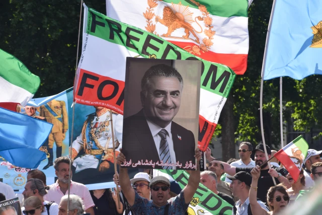 June 30, 2025, London, England, United Kingdom: Monarchy supporters holding pre-revolution Iranian flags and pictures of Reza Pahlavi gather in Parliament Square as the Crown Prince of Iran visits the parliament. (Credit Image: © Vuk Valcic/ Reuters