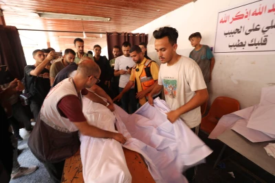 Christian mourners gather at Gaza City’s Al‑Ahli (Baptist) Hospital to collect a loved one’s body following an Israeli strike on the Holy Family Church, Gaza City, July 17, 2025. (Photo: via Reuters)