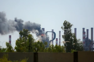 Smoke rises up in a unit of the Abadan oil refinery in southwestern Iran, July 19, 2025. Photo: Farid Hamoudi/Reuters