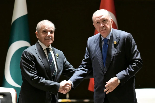 Pakistan's Prime Minister Shehbaz Sharif and Turkish President Tayyip Erdogan shake hands during a meeting on the sidelines of Shanghai Cooperation Organisation (SCO) Summit in Tianjin, China, August 31, 2025 Photo: Reuters Connect