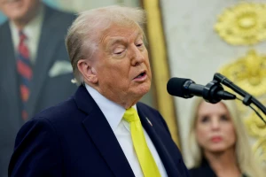 U.S. President Donald Trump speaks during a press conference in the Oval Office at the White House in Washington, D.C., U.S., October 15, 2025. REUTERS/Jonathan Ernst