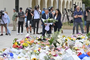 Israel’s Ambassador to Australia Amir Maimon places flowers at a makeshift memorial at Bondi Beach in Sydney, Tuesday, December 16, 2025 Photo: Reuters Connect by Mick Tsikas