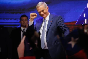 In Santiago, Chile, Republican Party presidential candidate Jose Antonio Kast greets a supporter after winning Chile's presidential election December 14, 2025 Photo: Reuters Connect by Reinaldo Ubilla