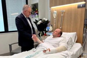Australia's Prime Minister Anthony Albanese visits Ahmed al Ahmed, the bystander who charged at one of the gunmen and seized his rifle during the deadly shooting at Bondi Beach, at St George Hospital in Sydney, Australia, December 16, 2025. Photo: Prime Minister's Office via Reuters Connect
