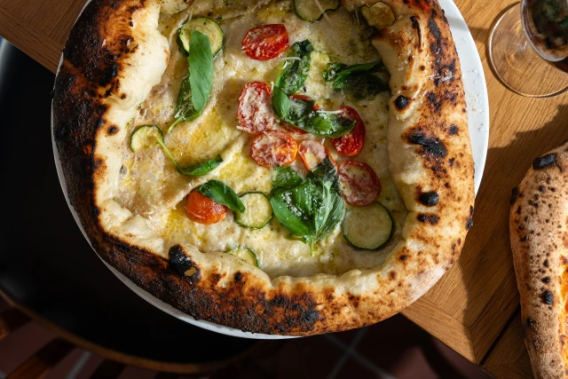 Photo from the official Facebook page of Pizzeria Piedra in Jerusalem, officially recognized as the world’s best kosher pizzeria.