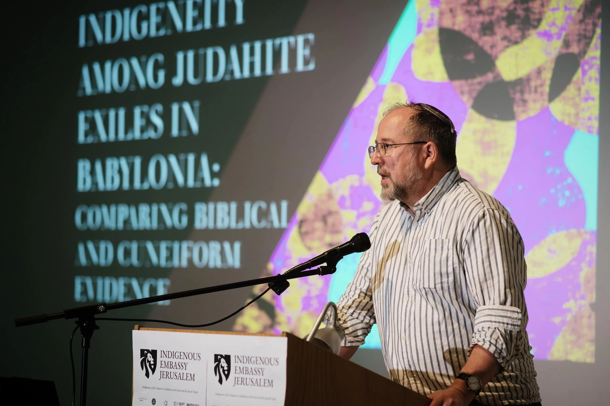 Assoc Prof Shawn Zelig Aster speaking at Indigenous Embassy Jerusalem Academic Symposium at the Bible Lands Museum. November 5 2025. Photo:  Indigenous Embassy in Jerusalem