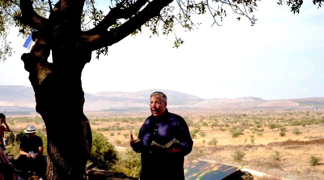 Joel C. Rosenberg, President of ALL ISRAEL NEWS and The Joshua Fund, teaching the Youth Pastors Delegation on the Israeli-Lebanon border. Photo credit: Joshua Fund and Faith Wins staff