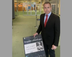 Israel's Ambassador to the United States and the United Nations Gilad Erdan with a picture showing antisemitism and incitement by UNRWA teachers on social media (Photo courtesy)