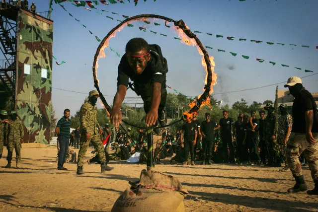 Palestinian youth demonstrate their skills during a graduation ceremony of a military-style camp organized by Hamas in Khan Younis in the southern Gaza Strip, Aug. 18, 2017. (Photo: Abed Rahim Khatib/Flash90)
