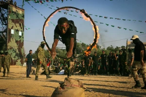 Palestinian youth demonstrate their skills during a graduation ceremony of a military-style camp organized by Hamas in Khan Younis in the southern Gaza Strip, Aug. 18, 2017. (Photo: Abed Rahim Khatib/Flash90)