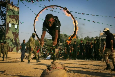 Palestinian youth demonstrate their skills during a graduation ceremony of a military-style camp organized by Hamas in Khan Younis in the southern Gaza Strip, Aug. 18, 2017. (Photo: Abed Rahim Khatib/Flash90)