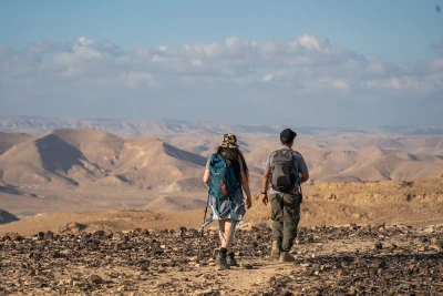 Travelers hike in Har Karkom, in the southwest Negev desert, on December 21, 2022. Photo by Yaniv Nadav/Flash90