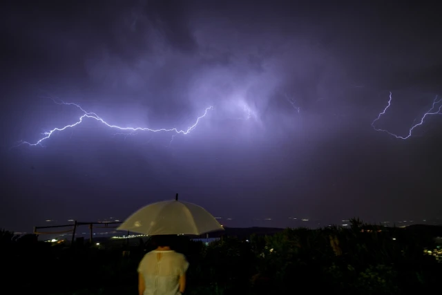 Lightning illuminates the sky over the over the Naftali Mountains and the Hula Valley, during a storm on June 3, 2023. Photo by Ayal Margolin/Flash90