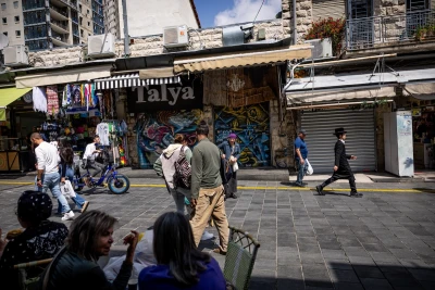 People walking at the Mahane Yehuda market in Jerusalem, on April 14, 2024. (Photo: Yonatan Sindel/Flash90)