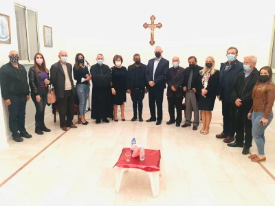 Father Joseph Yaakov hosted Defense Minister Gantz at his church in Haifa. (Photo: Blue and White)