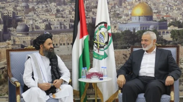 Hamas politburo chief Ismail Haniyeh meeting recently with Taliban leader Mullah Abdul Ghani Baradar (L) in Doha, Qatar (Photo: Hamas.ps)