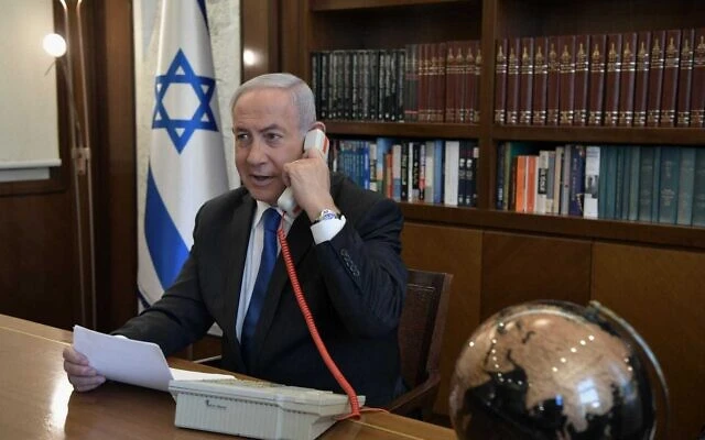 Israeli Prime Minister Benjamin Netanyahu on a secure phone call at his office in Jerusalem. (Photo: GPO)