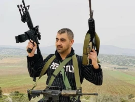 Palestinian doctor, Abdullah Abu Tin, who was reportedly a member of the Al-Aqsa Martyrs Brigades, is seen holding several assault rifles in an undated photo circulated online after his death during a clash with IDF soldiers, Oct. 14, 2022. (Photo: Twitter)