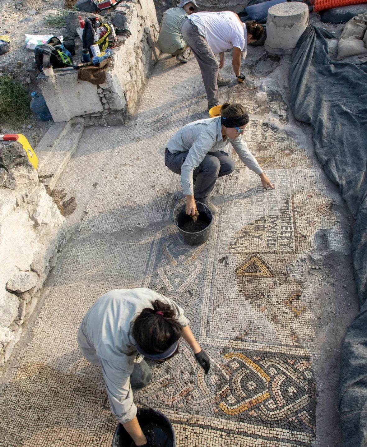 Final conservation efforts of two inscriptions in the western part of the church.Credit: Michael Eisenberg