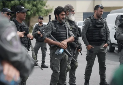 Israel Police SpokespersonIsraeli “Fauda” Actor Tzahi Halevi taking part in a real life law enforcement raid in the city of Lod, reportedly not part of a "photoshoot."