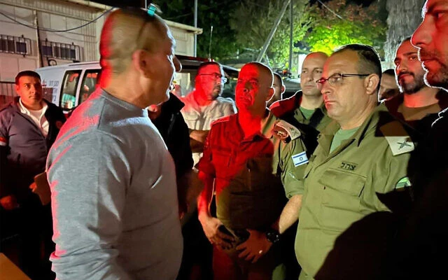 The family of Tiran Fero, an Israeli teenager whose body was snatched from a West Bank hospital by Palestinian gunmen, meets with security officials as his body is returned to Israel, November 23, 2022. (COGAT spokesperson's office)