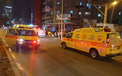 Police and medics at the scene of a shooting in Bnei Brak, on March 29, 2022. (Magen David Adom)