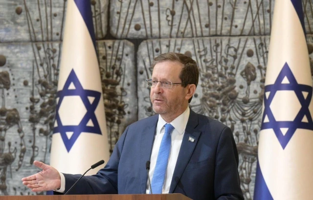 President Isaac Herzog speaks at a Bible lesson as part of the 929 initiative at the President's Residence in Jerusalem, February 19, 2023. (Amos Ben Gershom/ GPO)