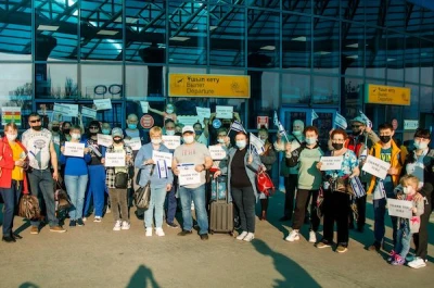 Jewish immigrants at airport in Alma Ata, Kazakhstan about to board flight to Israel (Photo: ICEJ)