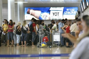Travelers wait in line for passports inspection in Ben Gurion Airport, Israel Aug 11 2007. Photo by Natri Shohat/Flash90