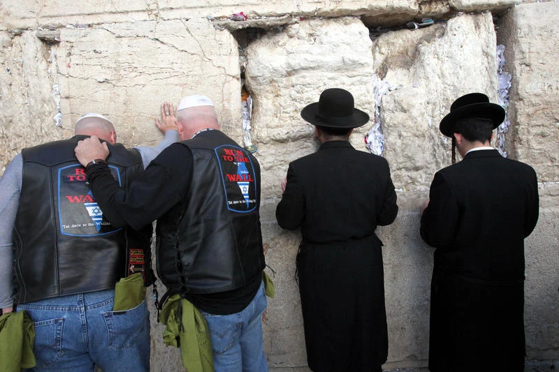 Participants of a delegation of motorcyclists from the United States, pray at the Western Wall in Jerusalem, 06 November 2011. The organization Mission M25, consisting of Evangelical pastors and military veterans ride through Israel on a nine day motorcade on Harley Davidson motorbikes as part of the Run to the Wall . Photo by Yossi Zamir/Flash 90