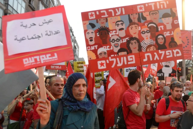 Hundreds march through the streets of Tel Aviv, as they celebrate May 01, Labour day. May 01, 2013 (Photo: Zeliger/FLASH90).