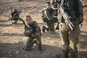 Soldiers of the Bardales Battalion train in urban warfare on an early morning, near Nitzanim in the Arava area of Southern Israel. Photo by Hadas Parush/Flash90