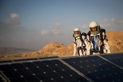 Israeli scientists walking near solar panels during a project simulates life in Mars, outside Mitzpe Ramon, Southern Israel, February 18, 2018, the D-MARS project is a a space analog research center in Israel, its founded by Israeli Space Agency and the Israeli Ministry of Science, Technology and Space. Photo by Yonatan Sindel/Flash90