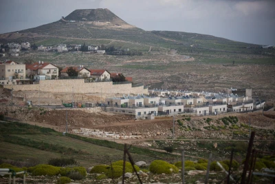 View of houses in a neighborhood in the Jewish settlement of Tekoa and the archeologial site of Herodion in the background, in Gush Etzion, West Bank, on February 11, 2019. Photo by Hadas Parush/Flash90